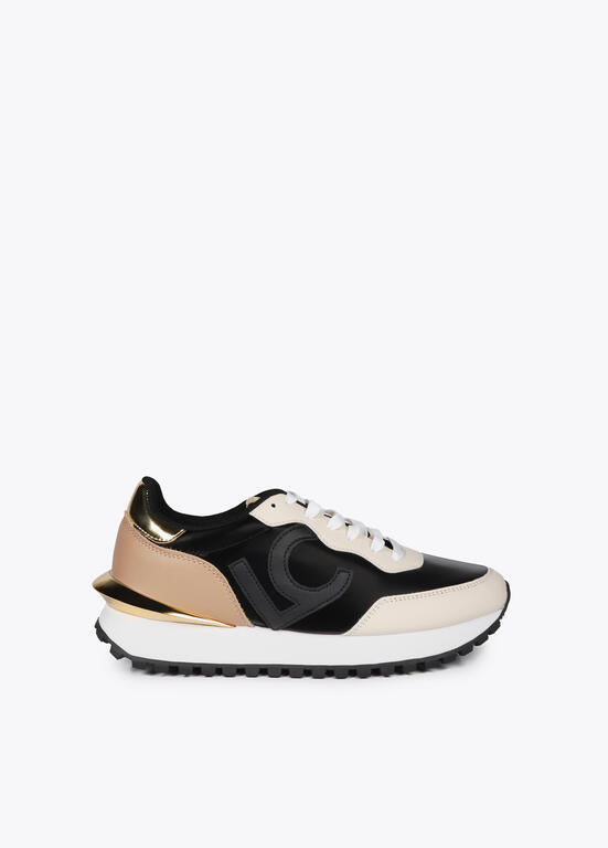 Deportivas Lola Casademunt detalles dorado negro espejo metal