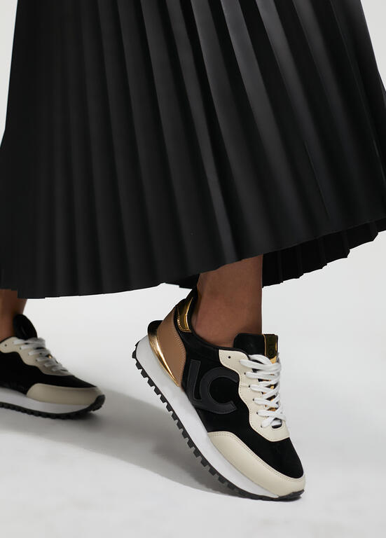 Deportivas Lola Casademunt detalles dorado negro espejo metal