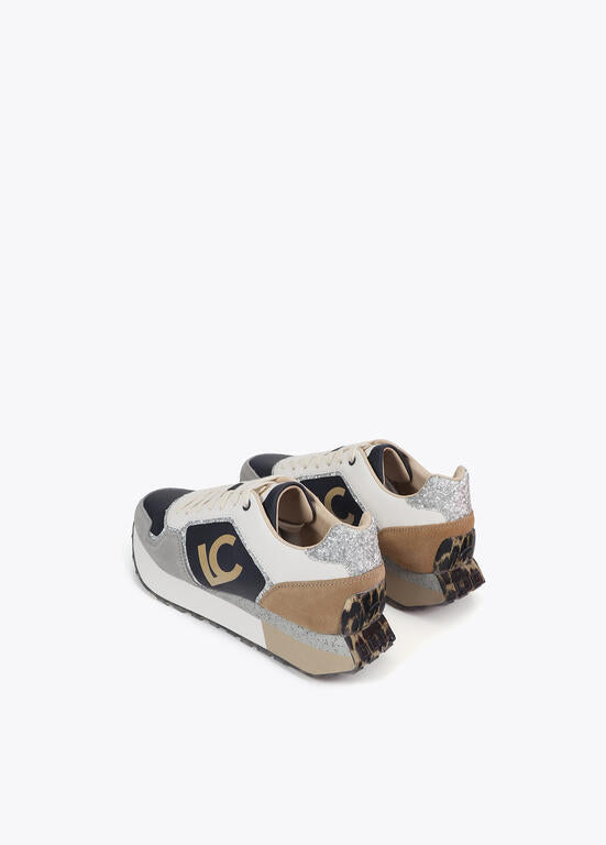 Deportivas Lola Casademunt con suela personalizada y estampado animal y detalles en piel