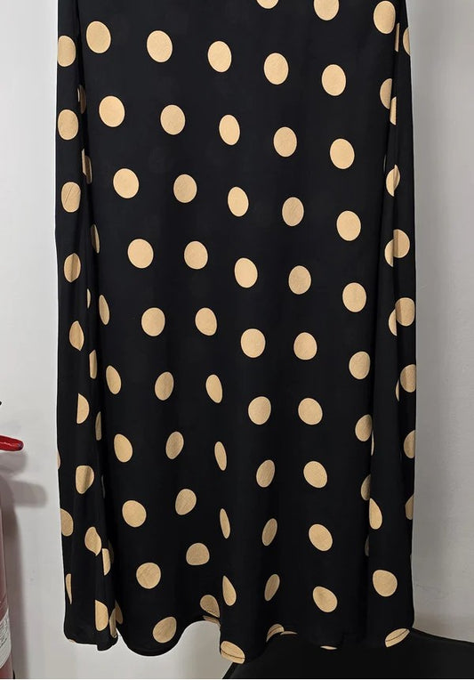 Falda estampada de lunares tono negro beige