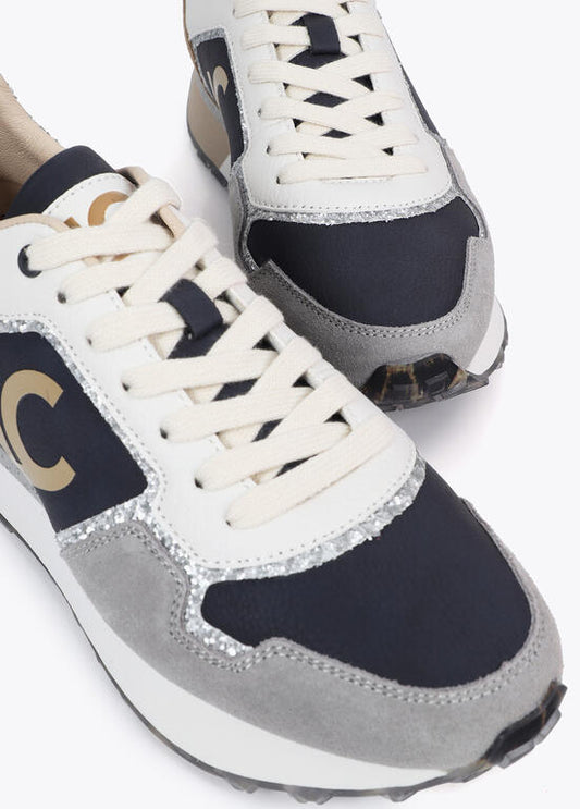 Deportivas Lola Casademunt con suela personalizada y estampado animal y detalles en piel