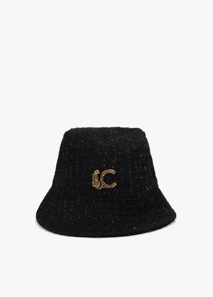 Sombrero Lola Casademunt tipo bucket tweed logo LC leopardo