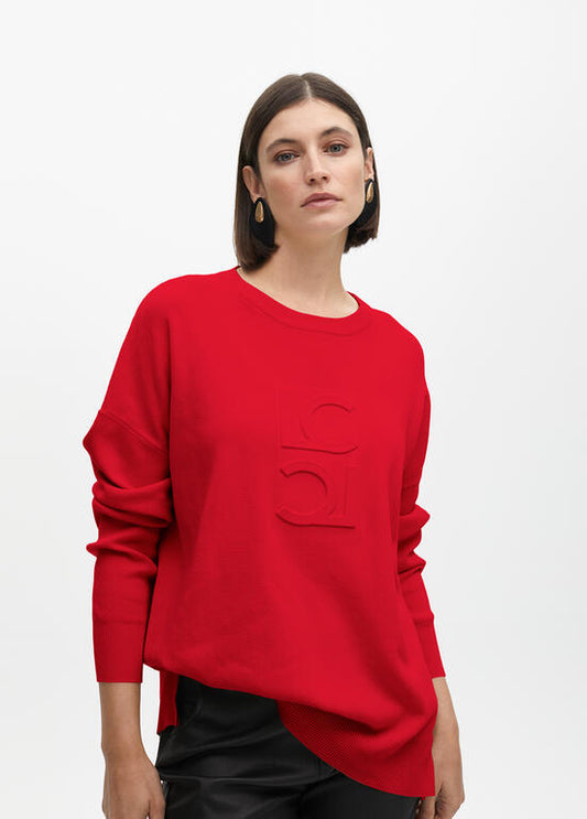 Jersey Lola Casademunt detalle logo en pechera Rojo