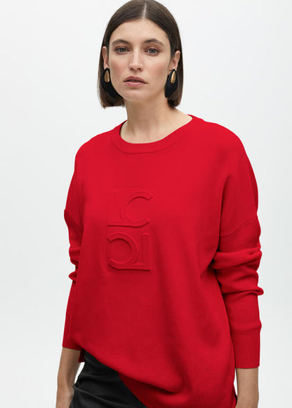 Jersey Lola Casademunt detalle logo en pechera Rojo