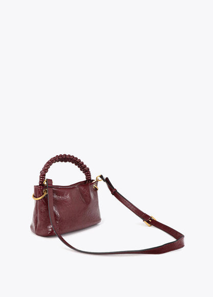 Bolso Lola Casademunt Bandolera pequeña con detalle de asa trenzada BURDEOS