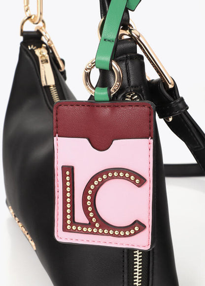 Bandolera Lola Casademunt efecto piel con colgante a contraste NEGRO