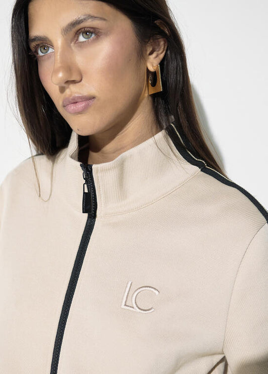 Sudadera Lola Casademunt con cremallera, detalle de banda lateral dos colores y strass colo BEIGE