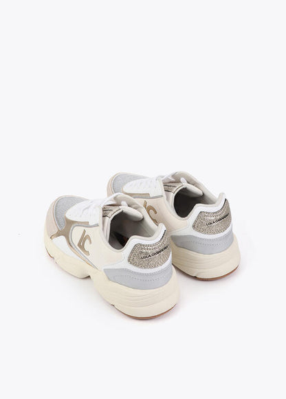 Deportivas Lola Casademunt tipo running tejidos combi detalles piel crudo metal